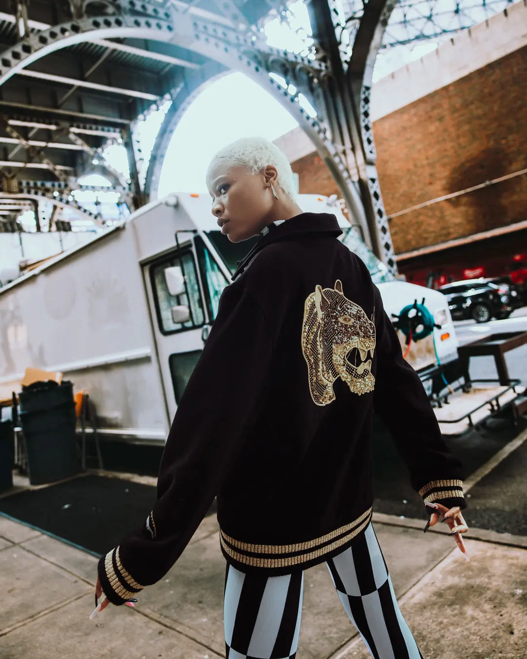 A.I.9 AFRICAN INTELLIGENCE GUILDED LEOPARD - SANDFLOWER COLLAB VARSITY JACKET - Image 4